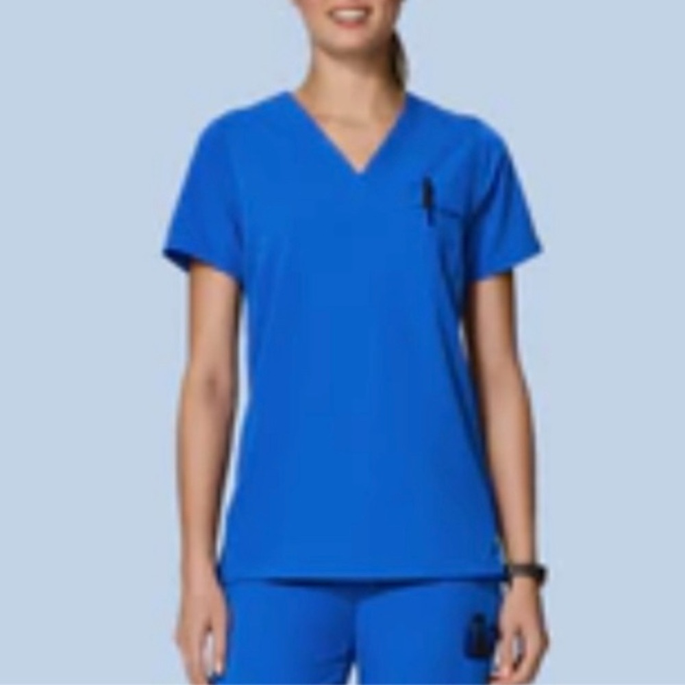 One front pocket scrub top in size small